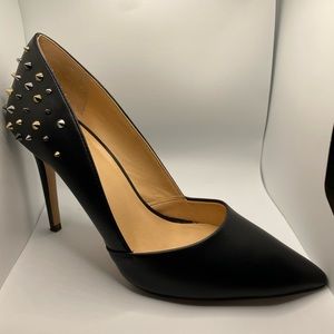 Black pumps with studs